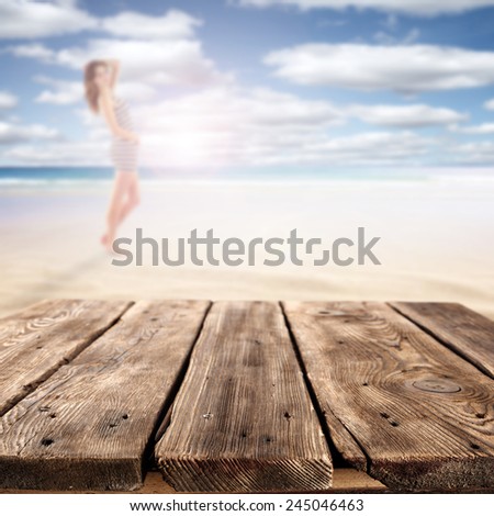 yellow sand on beach sky with sea and brown old table