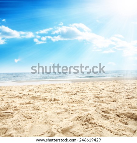 landscape of ocean and sun on sky with coast