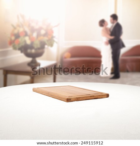wedding background and white tablecloth and desk of brown wood space