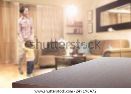 home interior with sofa and lamp and dark brown desk space