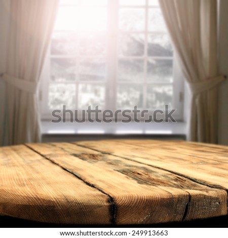 worn old table and window space of sun