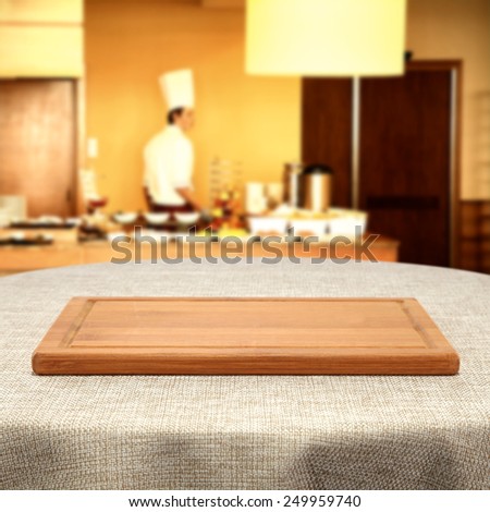 brown tablecloth and cook in bar interior