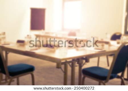 blurry background of office and window with sun light