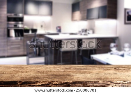 wooden desk space and kitchen