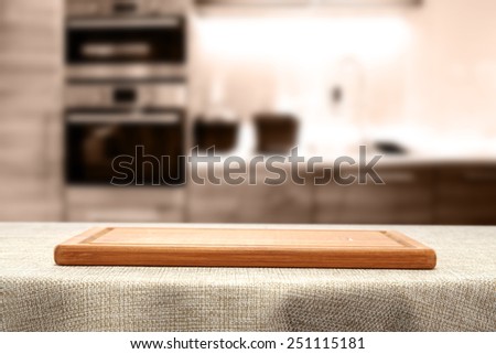 empty background of kitchen and desk of wood and tablecloth of brown color