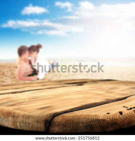 worn table of wood and sunny summer day