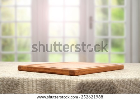 brown tablecloth and wooden desktop