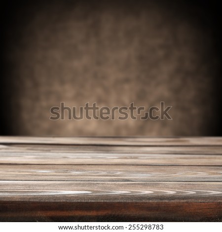 brown old wall background and retro old desk space of vintage chic