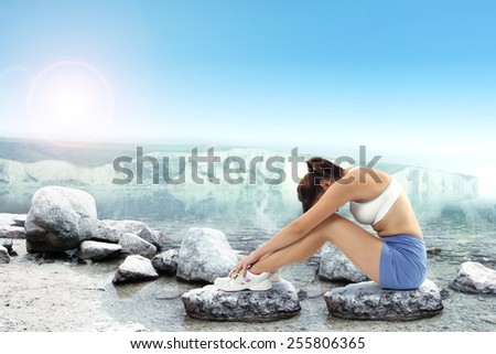 landscape of lake and woman in blue color