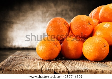 decoration of orange fruits and old worn table top
