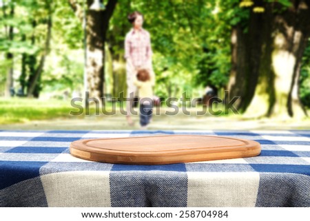 spring time and desk of wood on tablecloth
