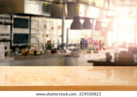 interior of kitchen in restaurant and yellow desk space and sun