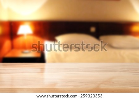 blur background of hotel room and yellow desk