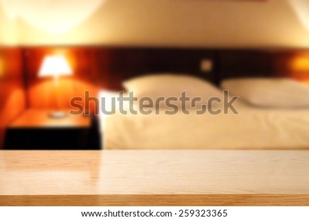 blur background of hotel room and desk space of yellow