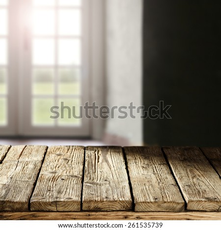 old worn table and window space of sun light
