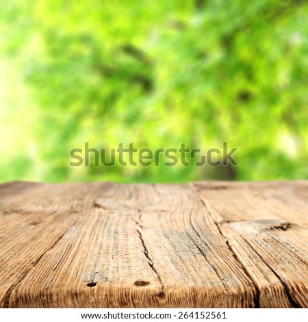 green space desk of wood and free space for you