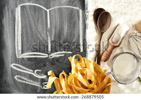 black chalkboard of flour and book of chalk mark