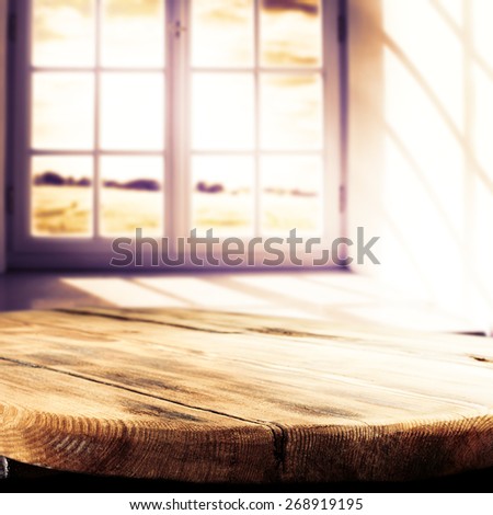 sun light in window and wooden big table of wood