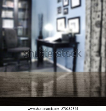 dark desk top and blue interior space