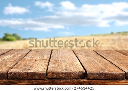 wooden desk top and sky