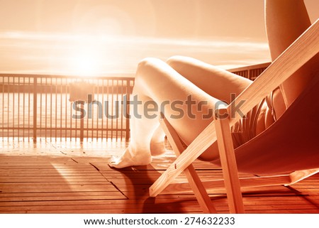 woman legs and sunset