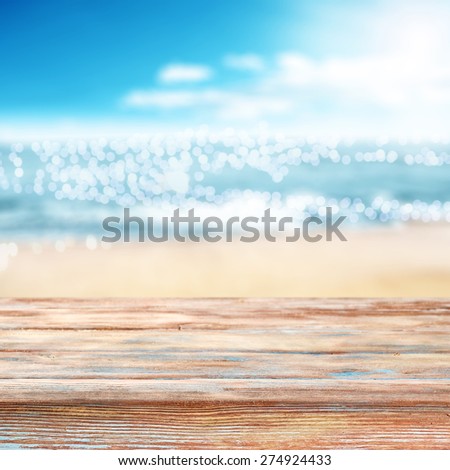 blurred background of sea coast and desk top of dirty colors