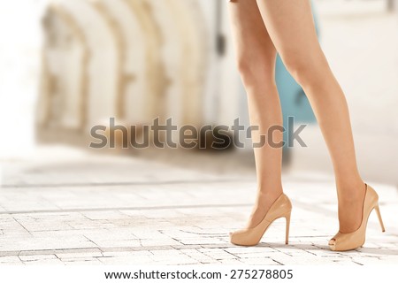woman on heels and street