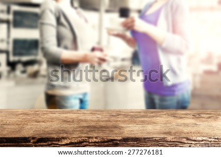 two friends drinking coffee and dark brown old top of wood