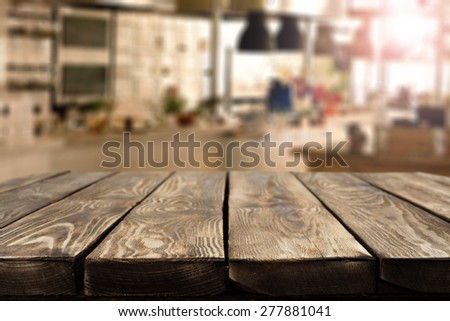 brown table in kitchen interior and sun