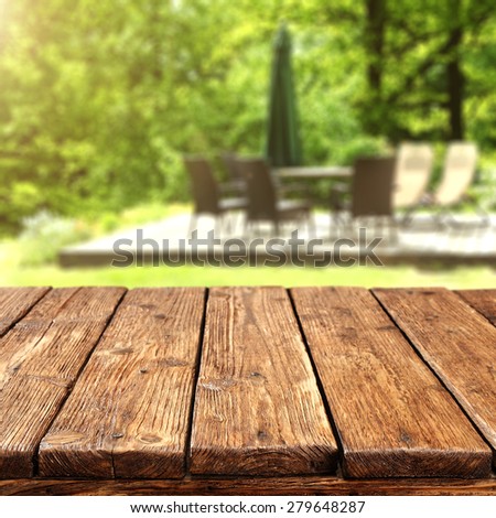 terrace background of table and chairs and worn old brown table
