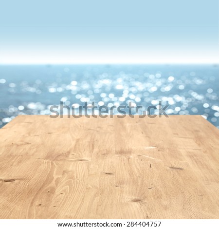 summer blurred sea and sky with space of wood of free