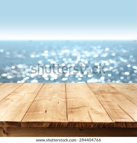 summer blurred sea and sky with board
