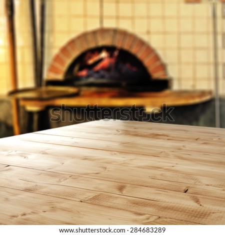 old pizza oven and desk top of yellow color in kitchen