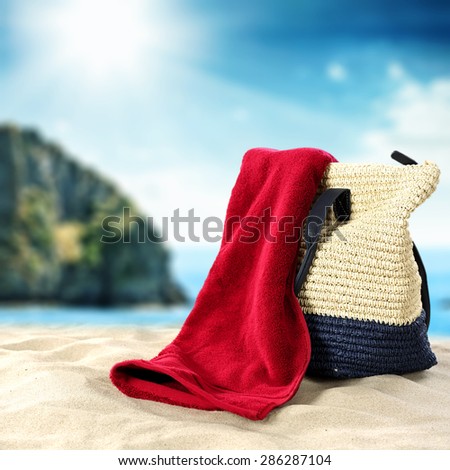 blue summer sky and sea of blue color with red towel