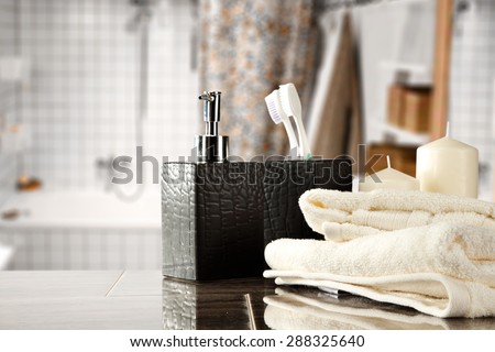 white towels and free space on top in bathroom