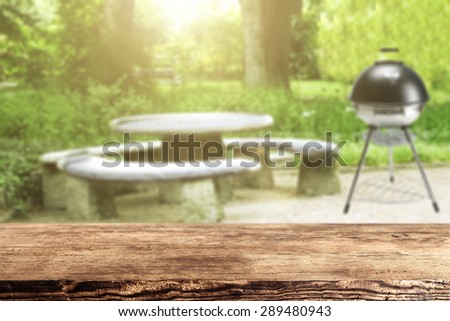green summer day in garden with desk space and napkin