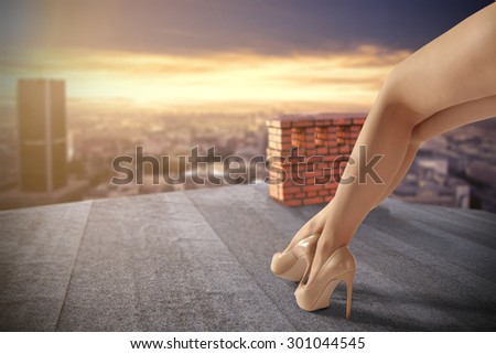 long legs heels and sunset on roof