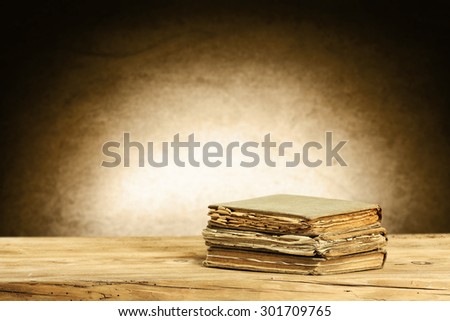 dark shadow on wall and wooden desk space of books and space for you