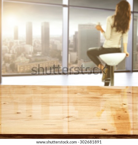blurred background of woman on chair with blue window of sun and yellow glasses wooden deck space