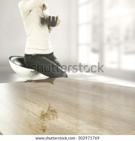 empty coffee table in gray color woman on chair and home interior