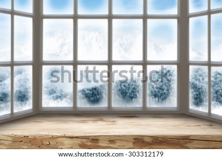 blurred background of window and worn old board of window sill