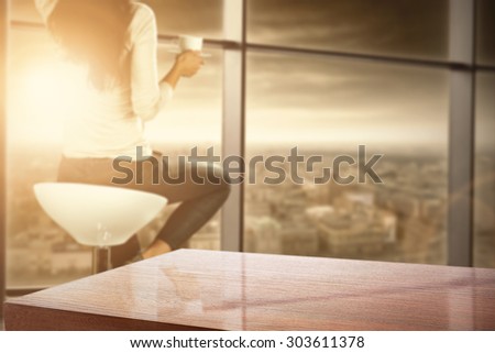 blurred background of sunset and window of city space and worn old desk space
