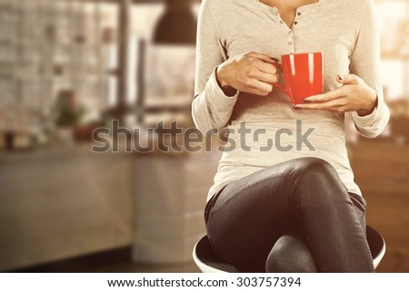 red mug woman and cafe interior