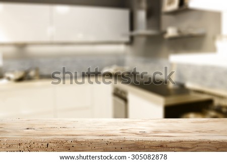 blurred background of kitchen and shabby wooden desk