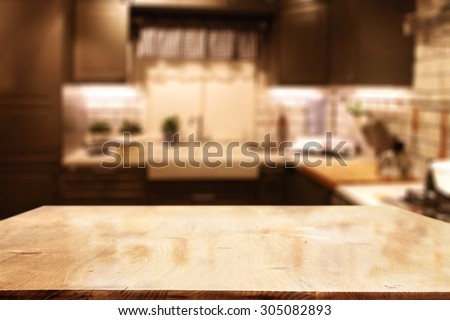 blurred background of kitchen and yellow wooden board place in retro room