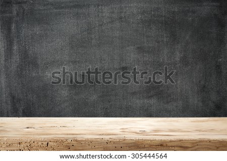 dark background of black board and free space for you and desk space