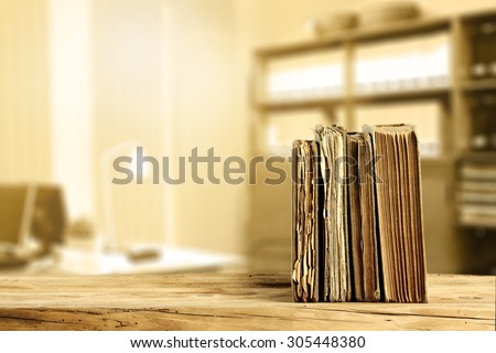 literature on desk and office interior