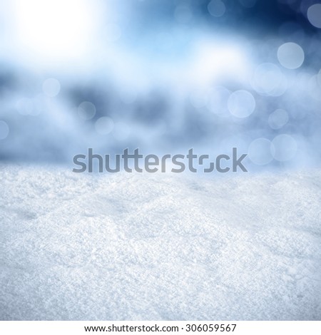 texture of snow and blue cold background of blurr