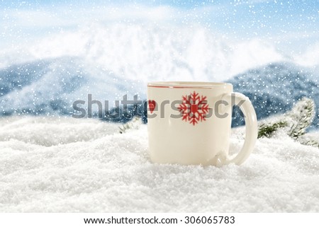 decoration of white mug and tea and snow space