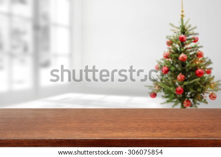 desk top of free place and xmas tree and white window